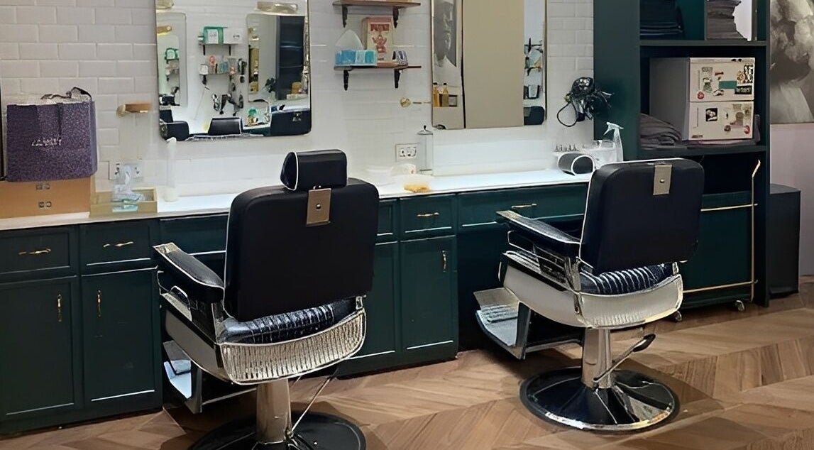 Modern barber chairs and mirrors at Canton Barber Causeway Bay, Hong Kong Island, HK.