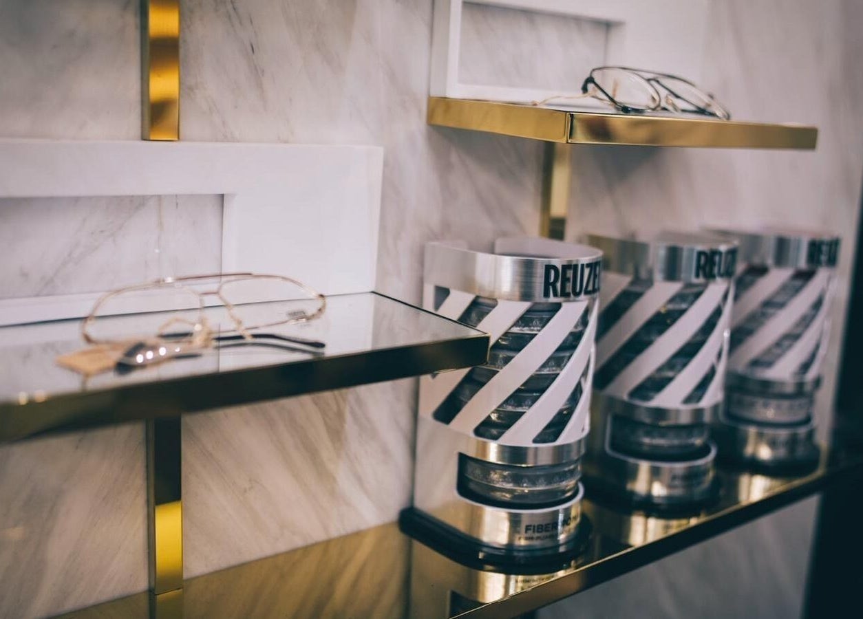 Stylish product display at Canton Barber Causeway Bay, Hong Kong Island, HK with grooming products.