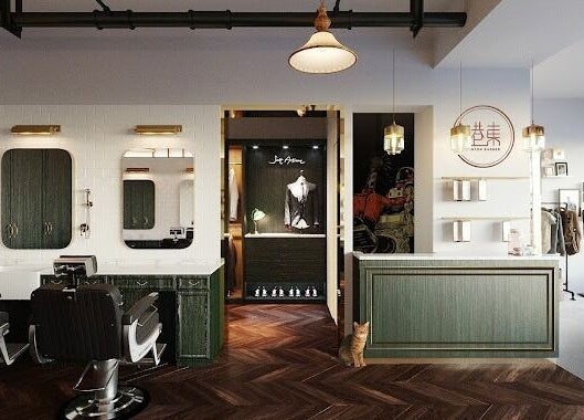 Elegant interior of Canton Barber Quarry Bay on Hong Kong Island, HK showcasing stylish hairdressing chairs.