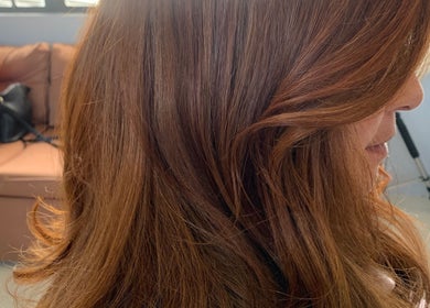 Side profile of styled brown hair at Studio40, Port of Spain, Port of Spain Corporation, TT.