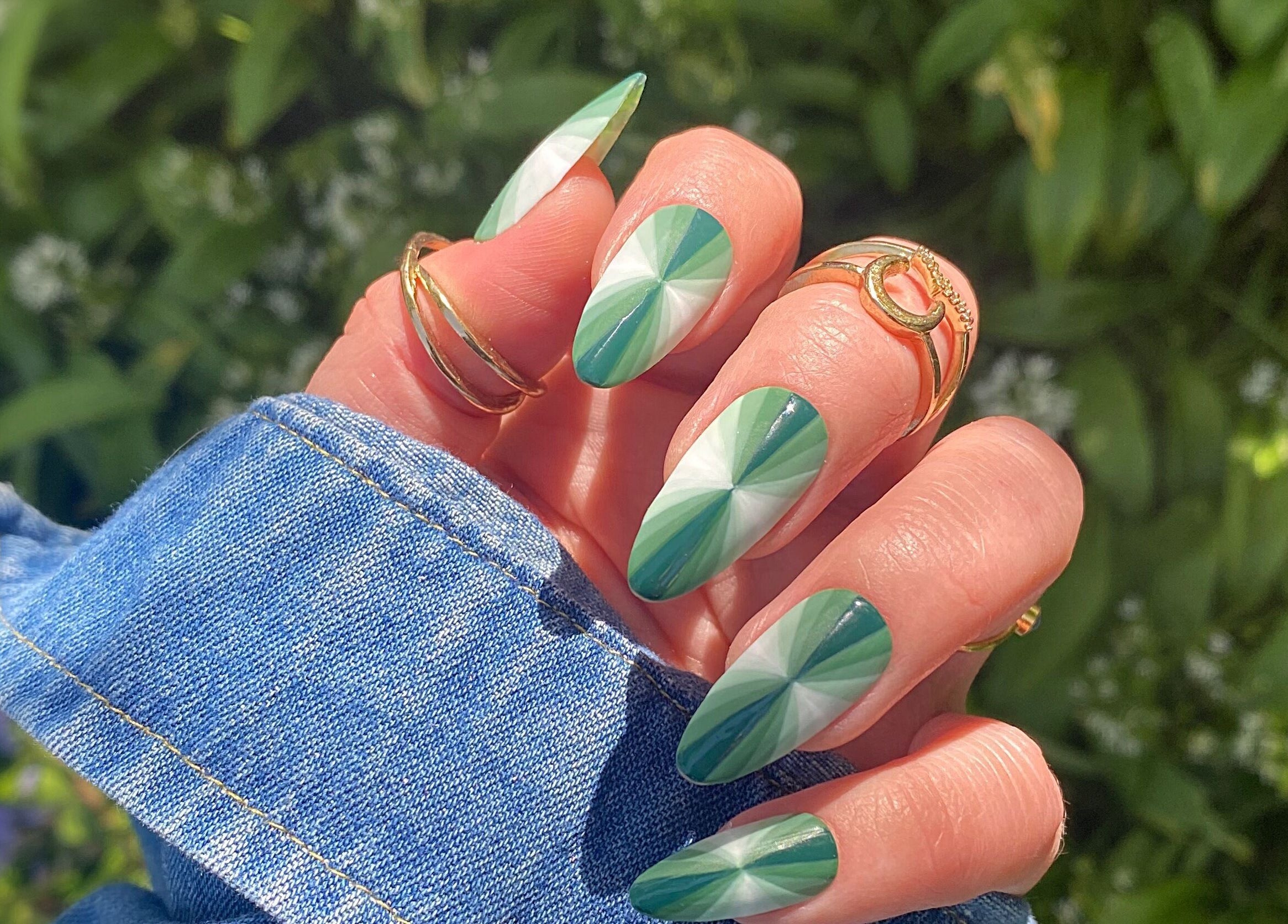 Stylish green nail art at Beauty Annex Hemyock, Hemyock, England, GB, showcasing unique geometric patterns.