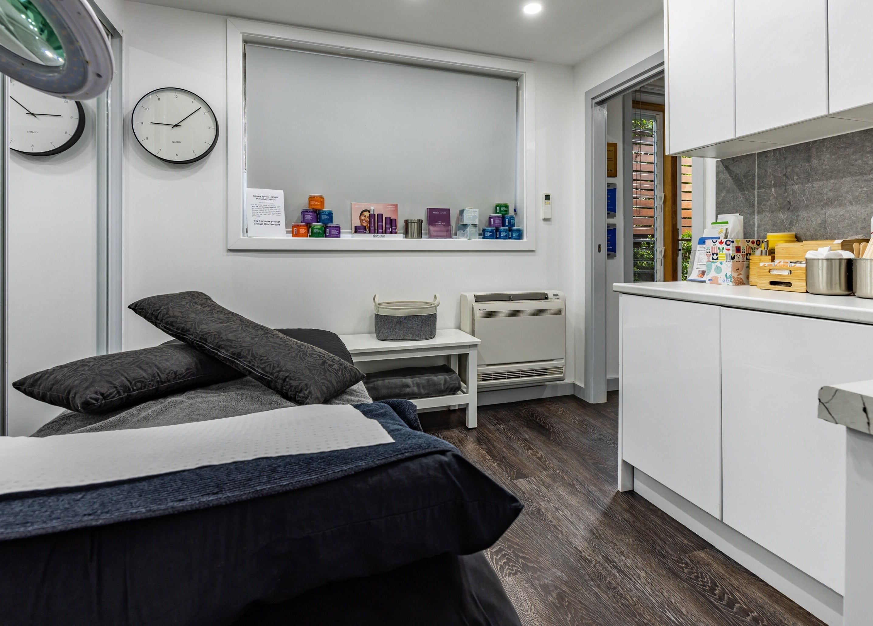 Cozy interior of Ouch Waxing Studio in Bonnet Bay, NSW featuring a waxing table, tools, and calming decor.