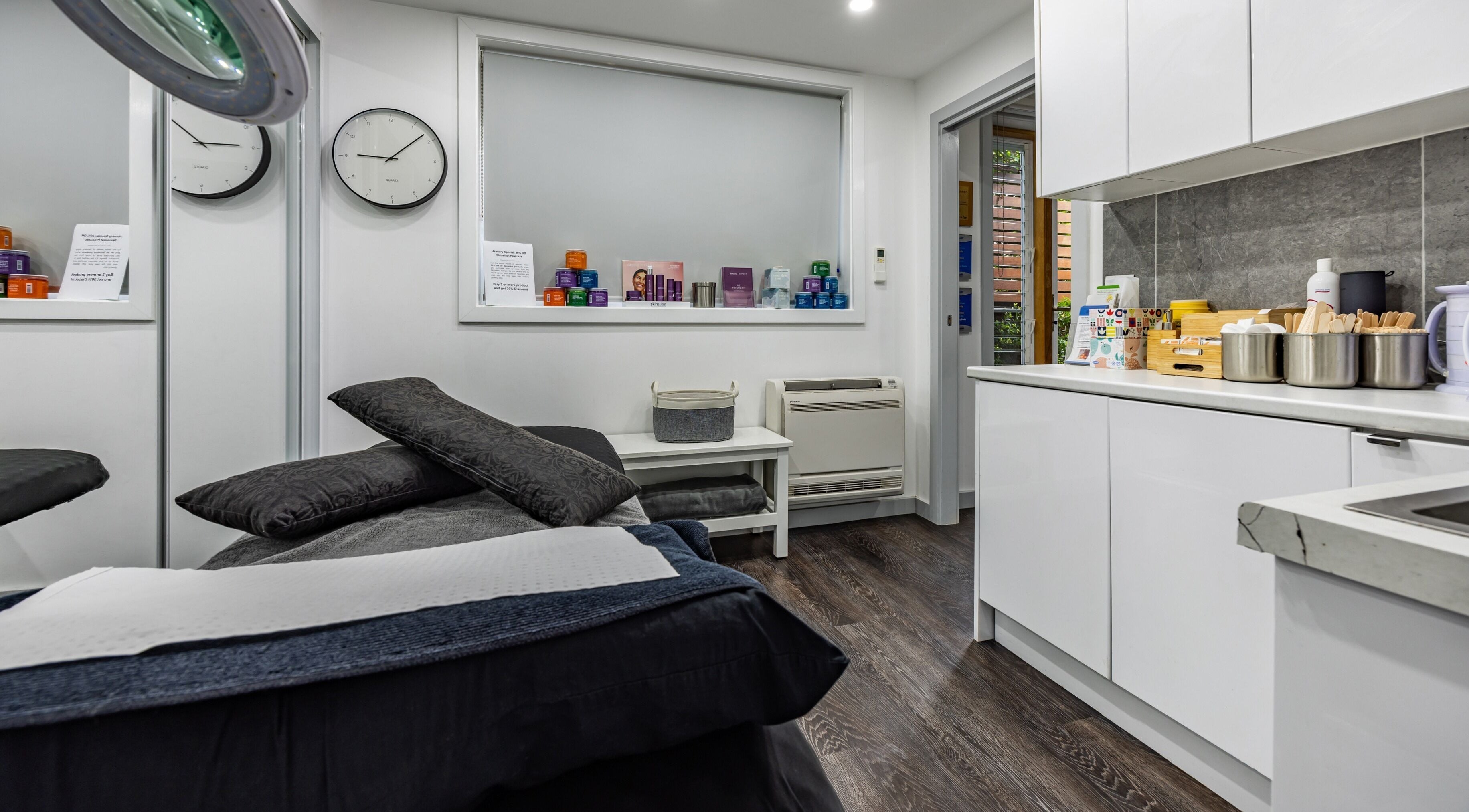 Cozy interior of Ouch Waxing Studio in Bonnet Bay, NSW featuring a waxing table, tools, and calming decor.