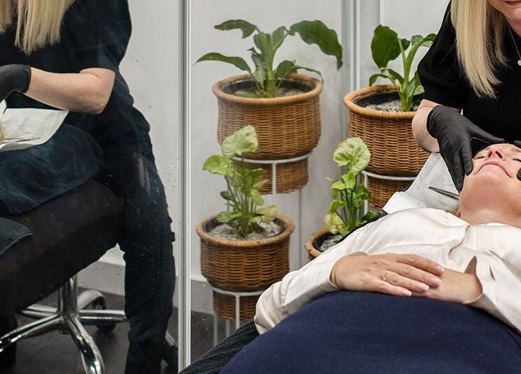 Facial treatment at Ouch Waxing Studio, Bonnet Bay, New South Wales, AU with plants in the background.