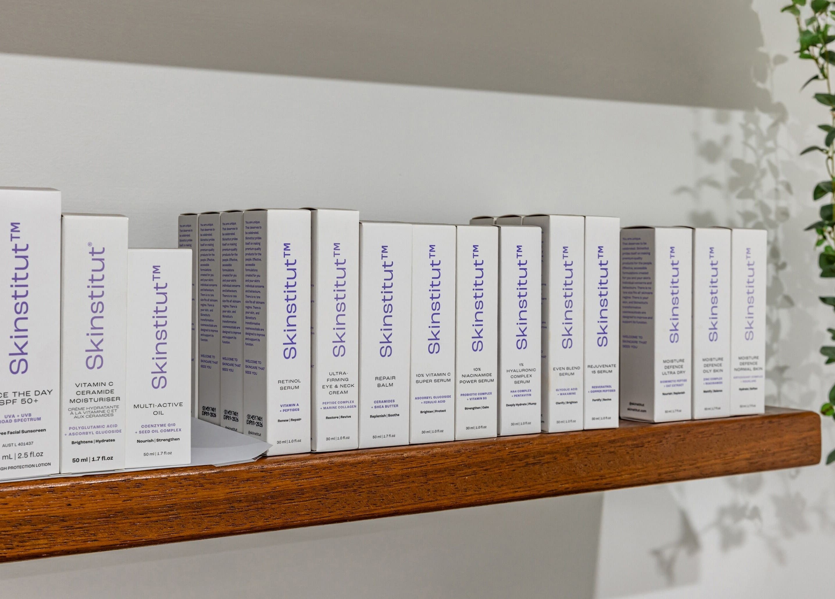 Skinstitut products on a wooden shelf at Ouch Waxing Studio, Bonnet Bay, New South Wales, AU.