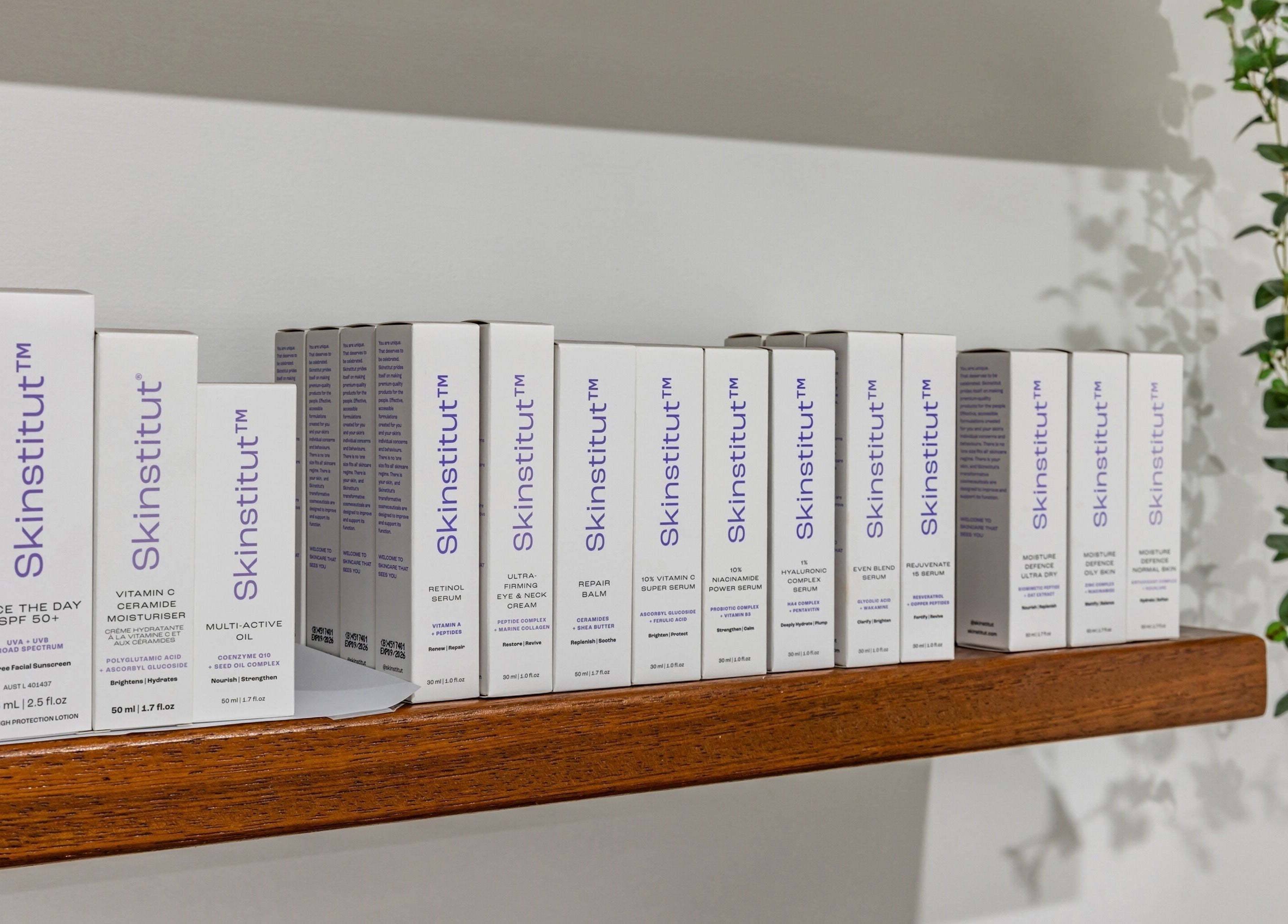 Skinstitut products on a wooden shelf at Ouch Waxing Studio, Bonnet Bay, New South Wales, AU.