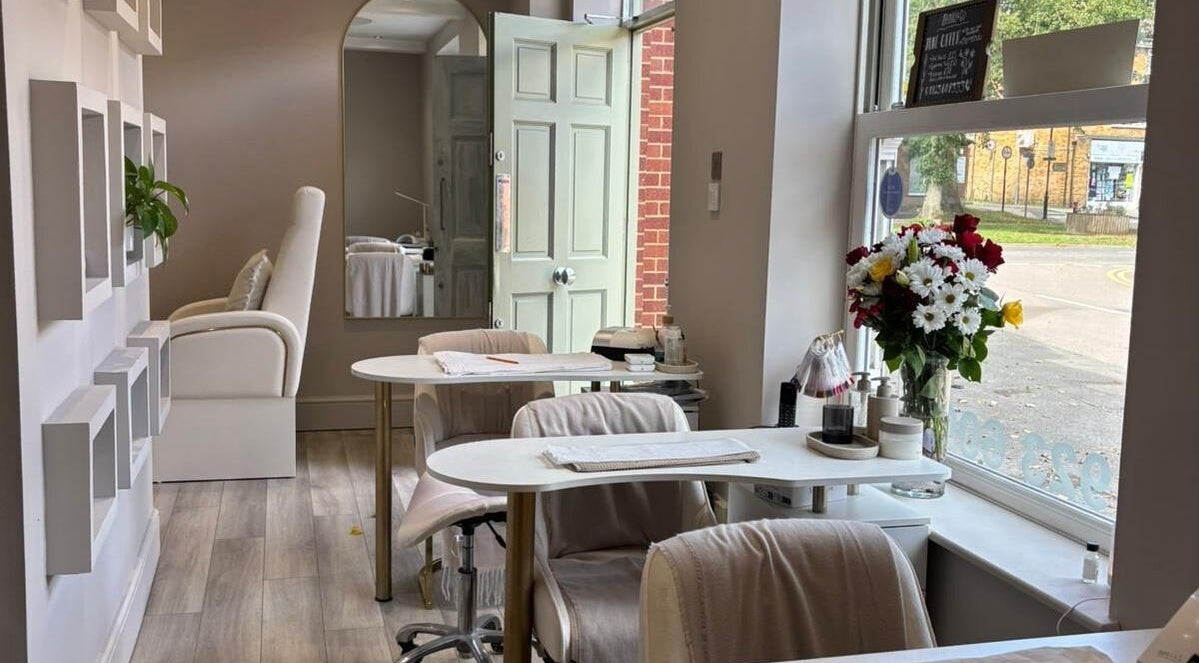 Elegant interior of Beauty By Anna Ashley at Beauty & Co, Abbot’s Langley, GB, featuring chic decor and floral display.