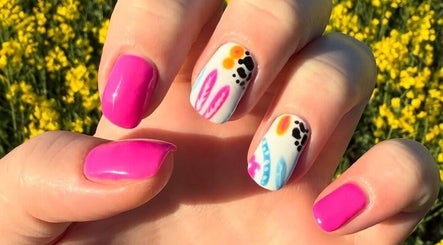 Vibrant pink and floral nail art at Beauty By Anna Ashley, Beauty & Co, Abbot’s Langley, GB.