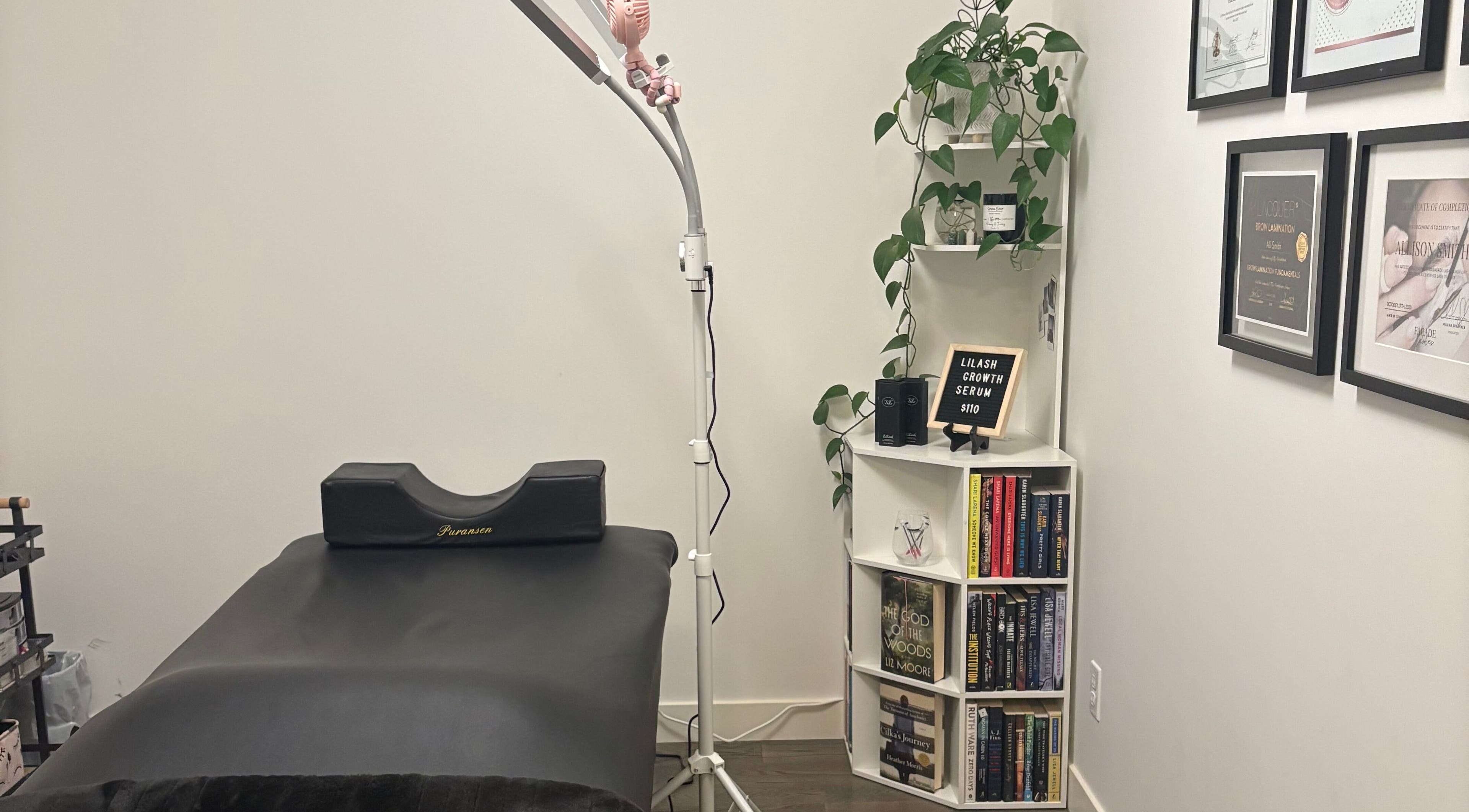Elegant treatment room at Lash Alley YYC, Calgary, Alberta, CA with cozy setup and greenery.
