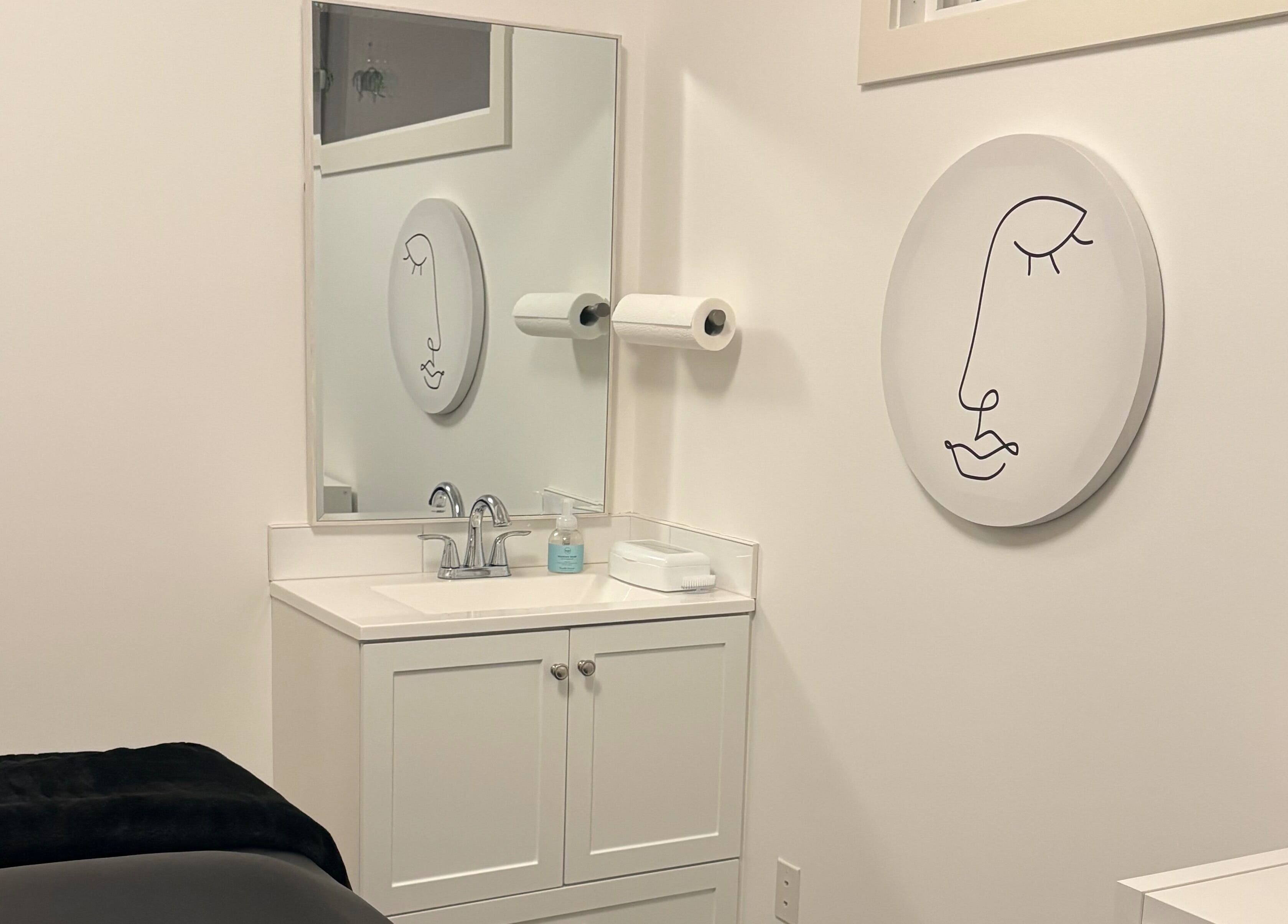 Modern treatment room at Lash Alley YYC in Calgary, Alberta, CA featuring minimal decor and a serene atmosphere.