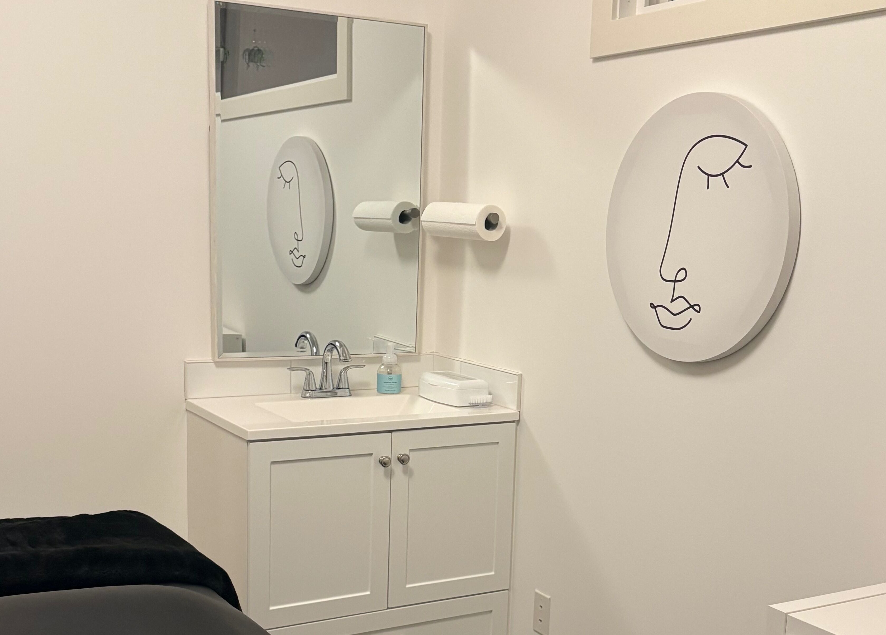 Modern treatment room at Lash Alley YYC in Calgary, Alberta, CA featuring minimal decor and a serene atmosphere.