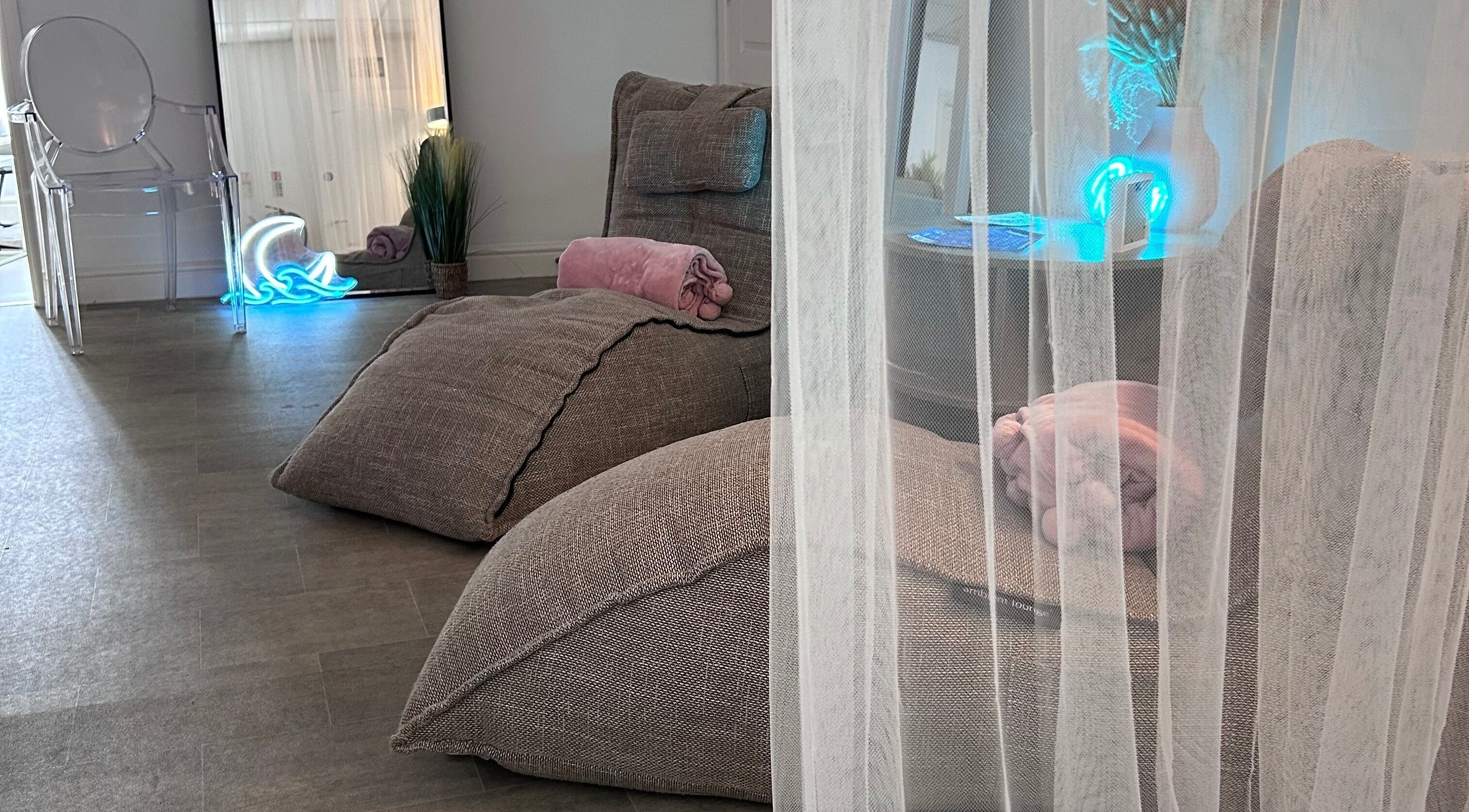 Relaxing lounge area with plush seating at Sincerity Beauty Rebecca, Worsley, England, GB.