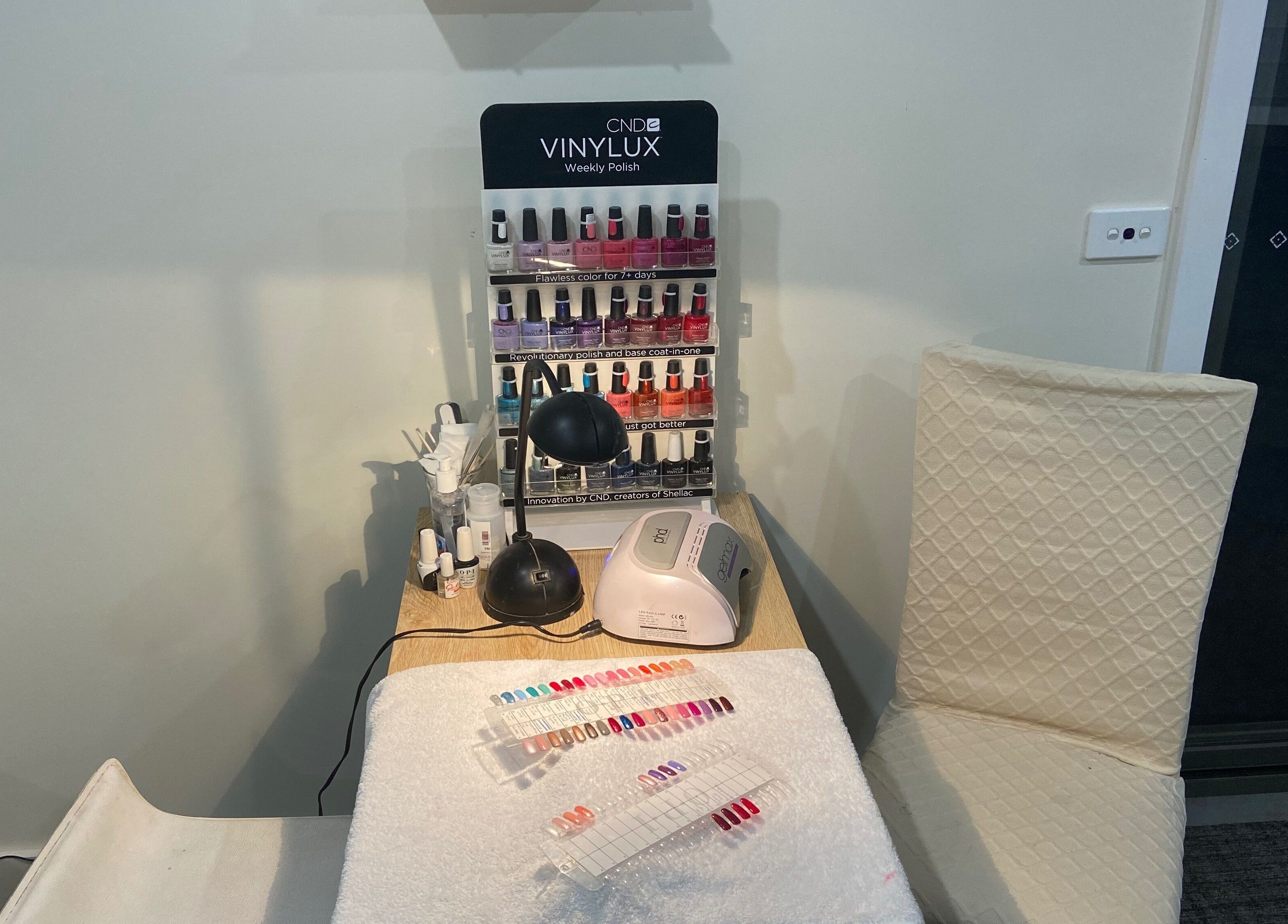 Colorful nail polish display at Sunset Waxing Beauty Studio in Melbourne, Victoria, AU.