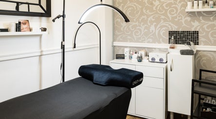 Elegant treatment room at SB Studio in Coulsdon, England, GB with stylish decor and state-of-the-art equipment.