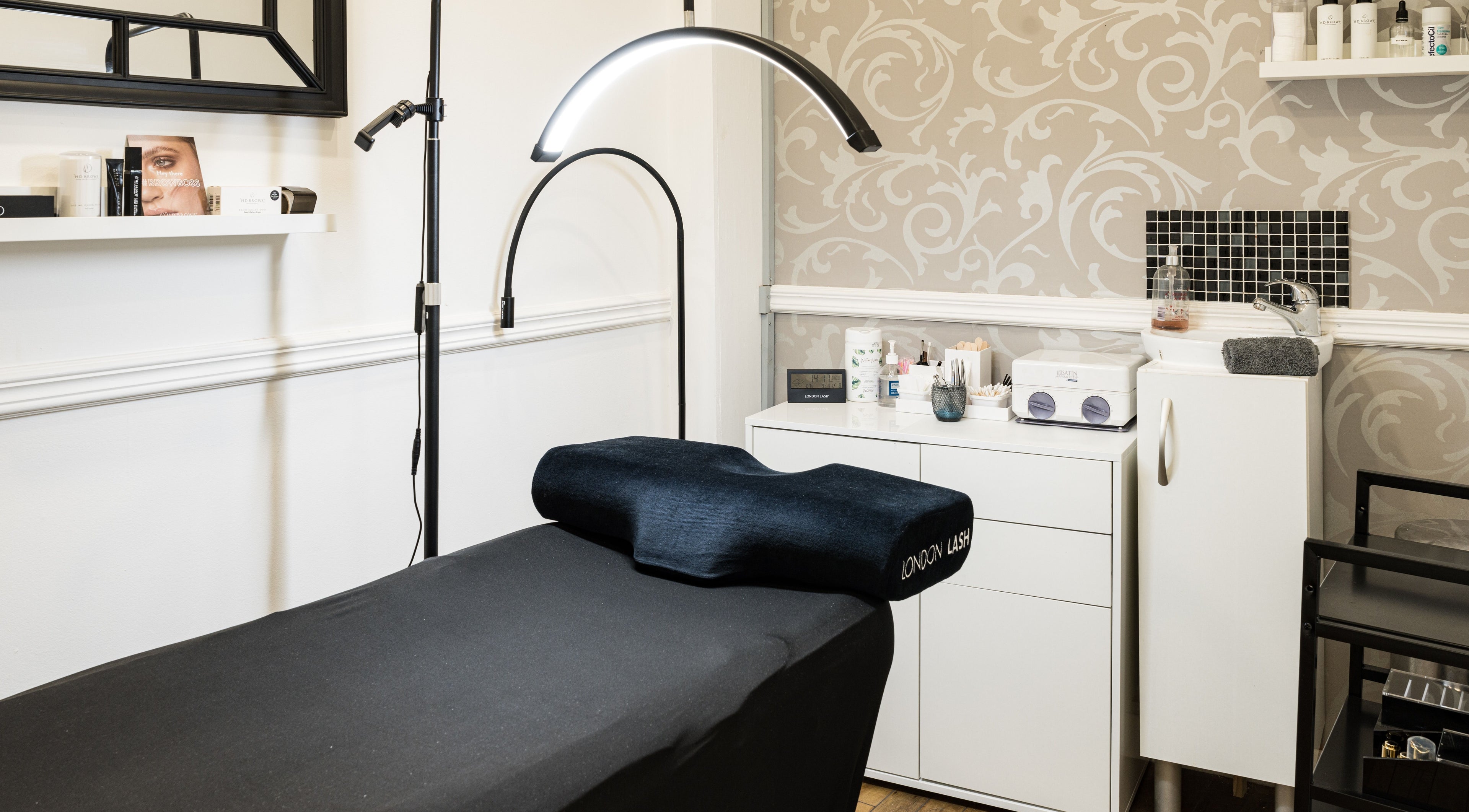 Elegant treatment room at SB Studio in Coulsdon, England, GB with stylish decor and state-of-the-art equipment.