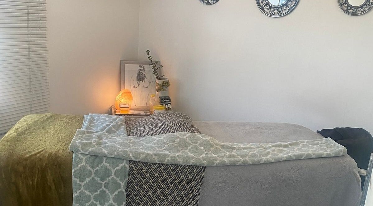 Peaceful massage room at Jia Life @ NHW in Cape Town, Western Cape, ZA with soft lighting and cozy decor.