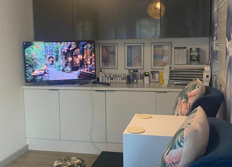 Relaxing lounge area at Secrets Health Beauty and Day Spa in Ballito, Kwazulu-natal, ZA, featuring plush seating.