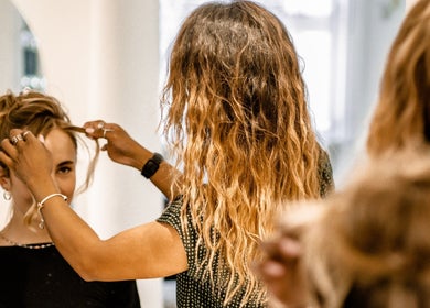 Stylist crafting a chic hairstyle at Citrine Hair Salon by Layla, Cape Town, Western Cape, ZA.