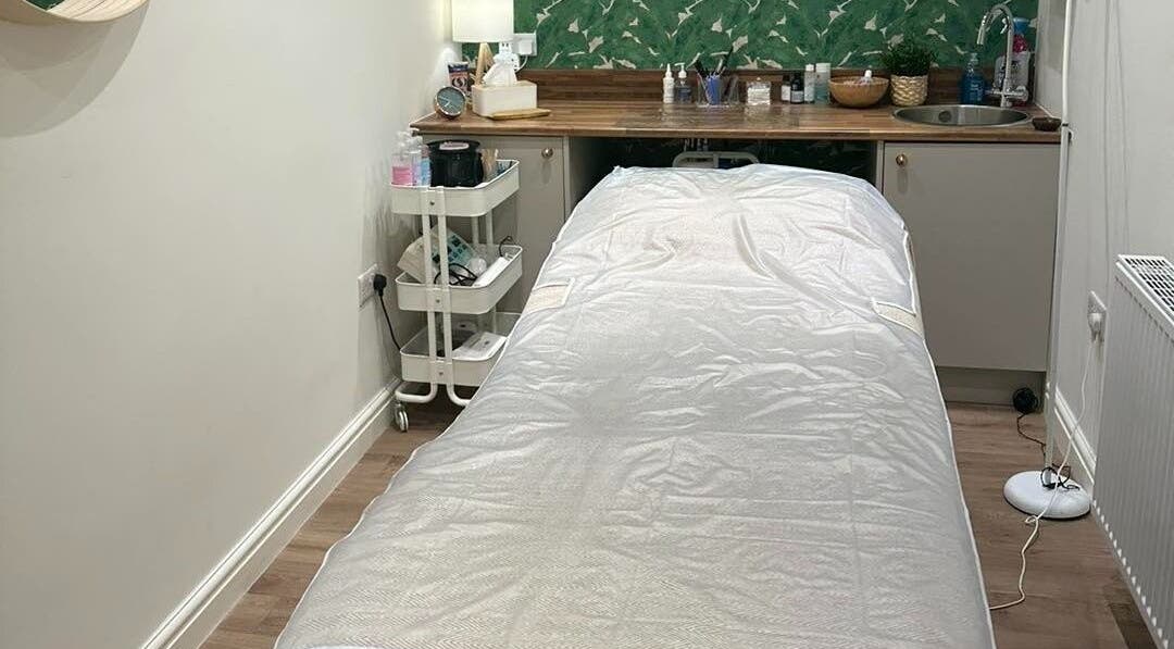 Serene treatment room at Holme Beauty & Ear Care, Holme-on-Spalding-Moor, England, featuring a cozy massage table.