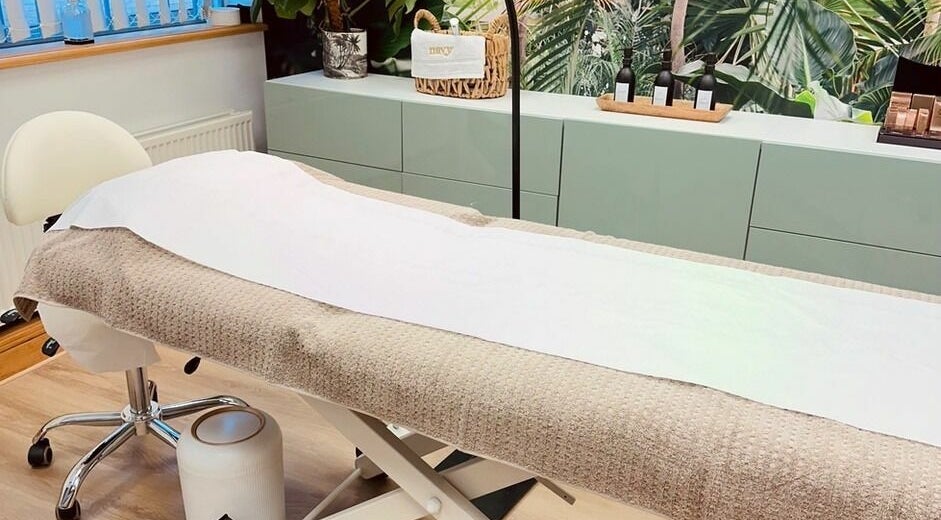 Comfortable treatment bed at StefyBrows, Harpenden, England. Relaxing wellness environment.
