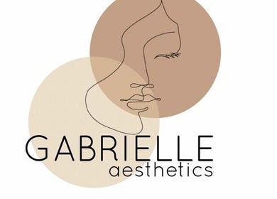 Minimalist logo for Gabrielle Aesthetics in Lichfield, England, GB featuring elegant line art face design.