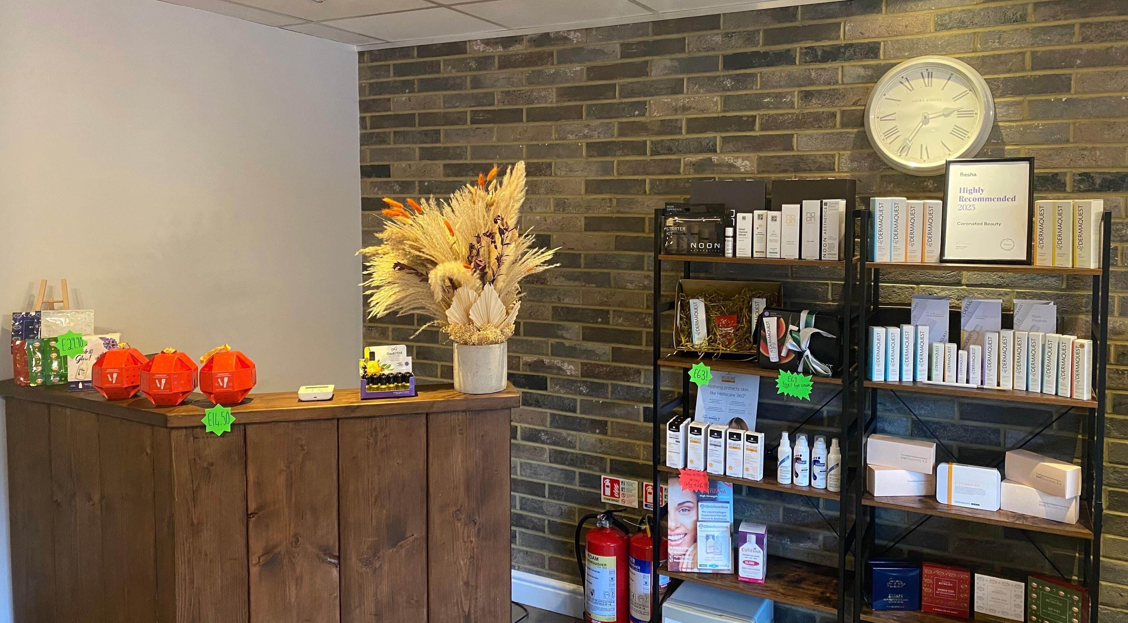 Reception corner at Coronated Beauty, Eaton Bray, England, GB featuring natural decor and beauty products.