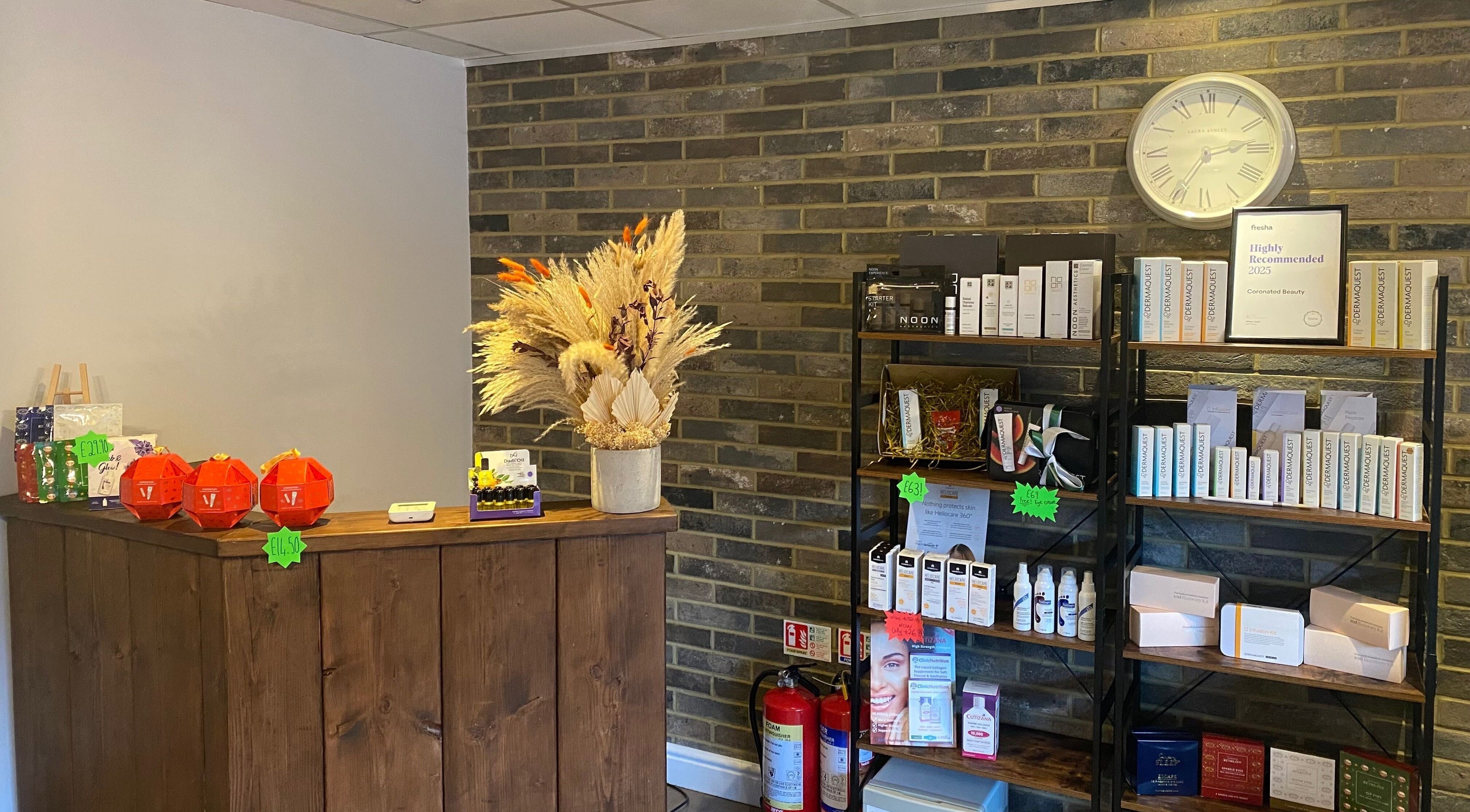 Reception corner at Coronated Beauty, Eaton Bray, England, GB featuring natural decor and beauty products.