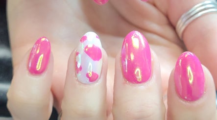 Vibrant pink nail design by Polished Designs by Danielle in Mount Horeb, Wisconsin, US.