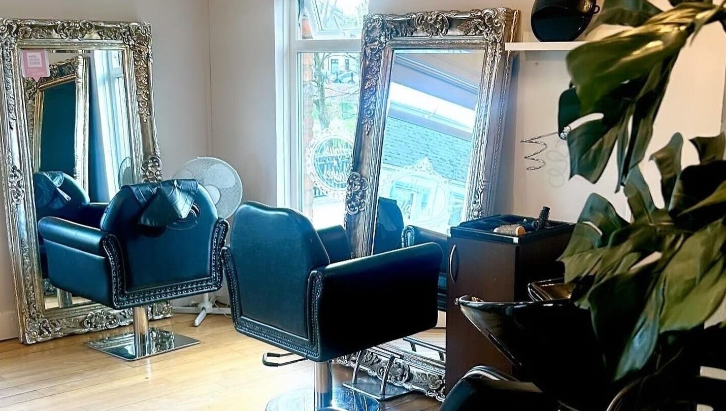 Chic hair styling chairs and ornate mirrors at Claire Scott Professional Hairstylist, Ballyclare, Northern Ireland, GB.