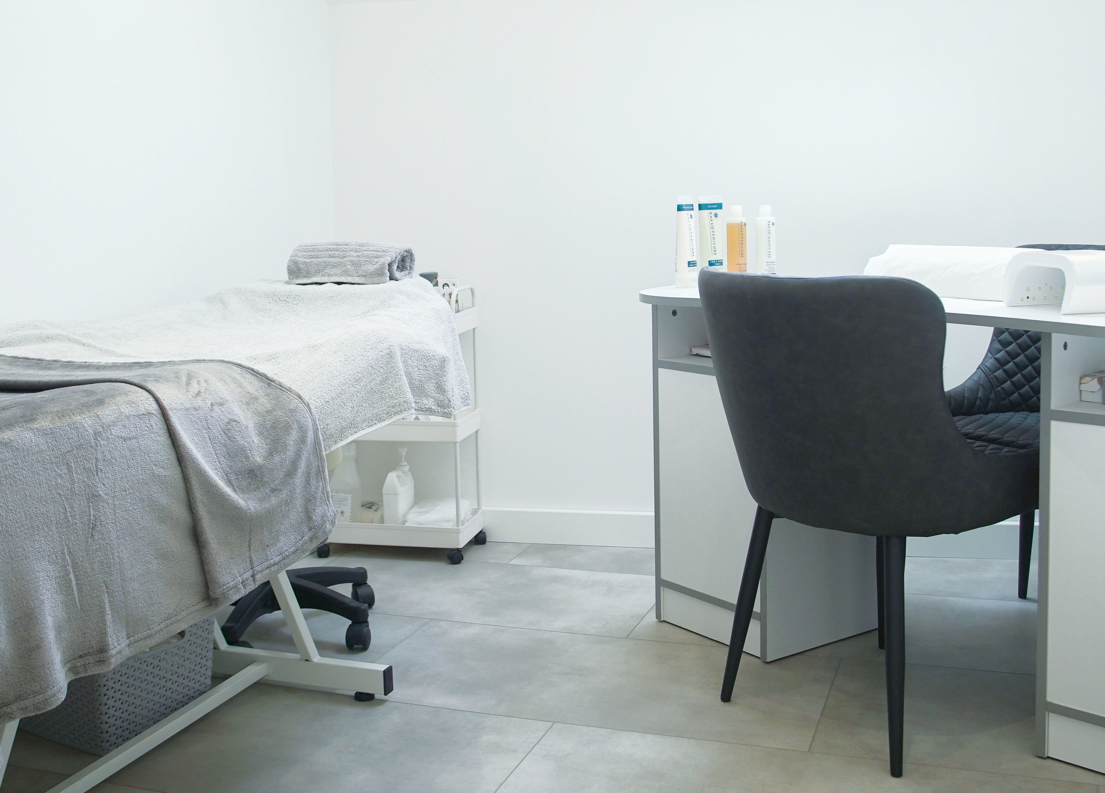 Tranquil treatment room at Kaleido Hair & Beauty, Whitwell, England, GB showcasing modern spa amenities.