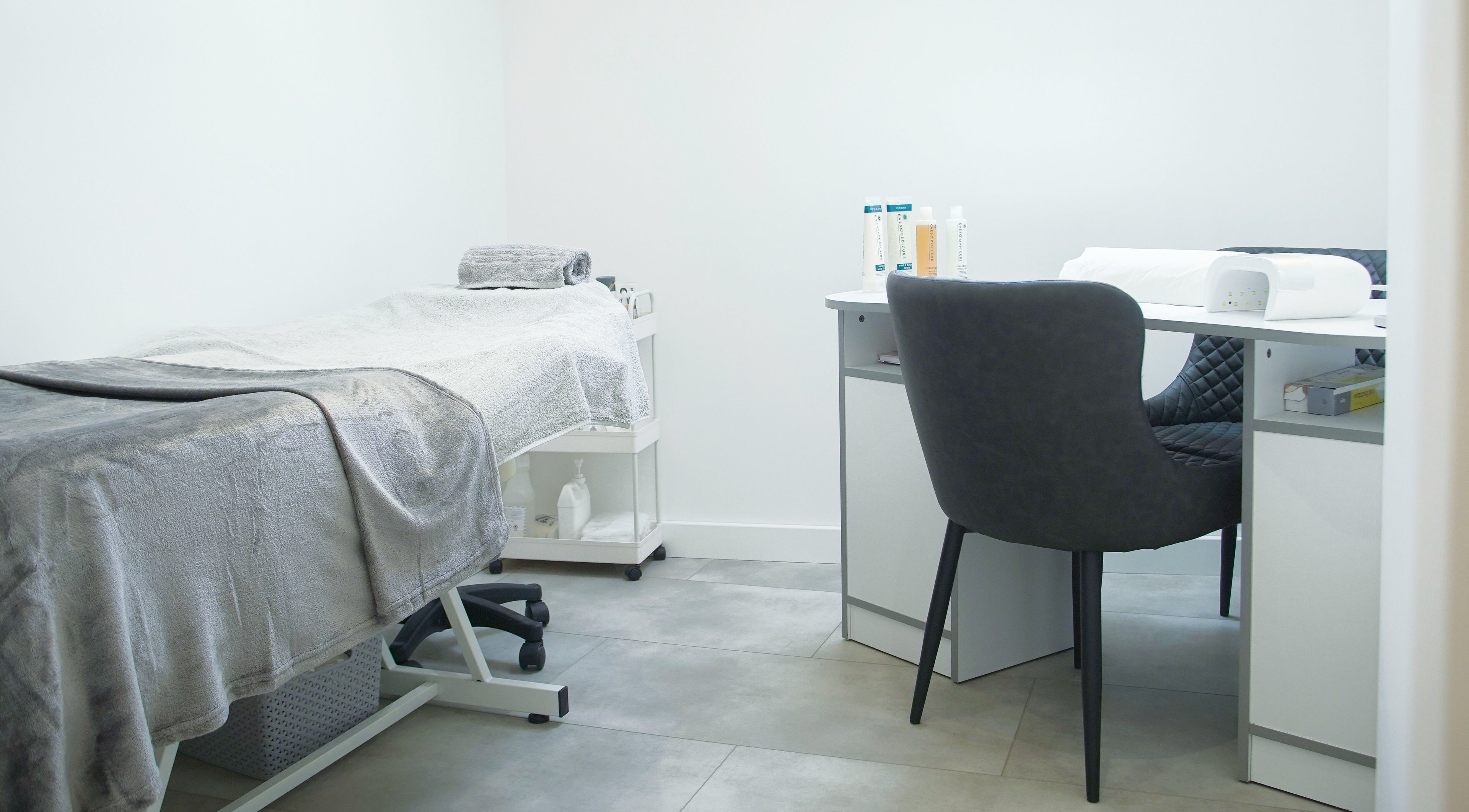 Tranquil treatment room at Kaleido Hair & Beauty, Whitwell, England, GB showcasing modern spa amenities.