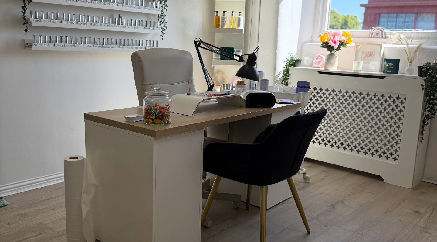 Modern nail station at Versari Beauty Paisley, Paisley, Scotland, GB with sleek decor and vibrant accents.