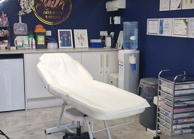 Treatment room at Pout Aesthetics and Beauty, Blackpool, England, GB featuring a comfy treatment bed.