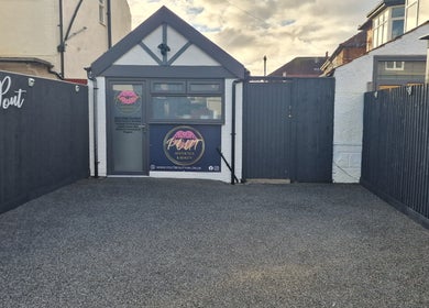 Front view of Pout Aesthetics and Beauty, Blackpool, England, GB, showcasing entrance and signage.