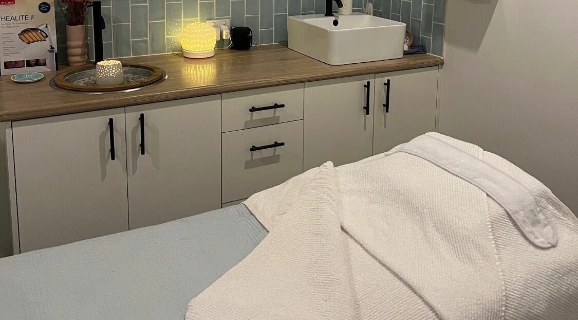 Relaxing treatment room at Azure Skin And Beauty, Terranora, New South Wales, AU with cozy decor and soft lighting.