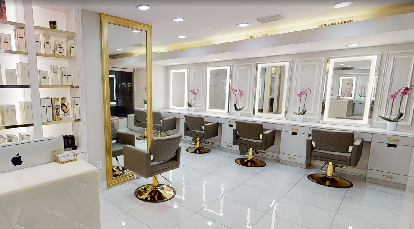 Chic interior of Bon Bon Salon with modern styling chairs in New York, New York, US.