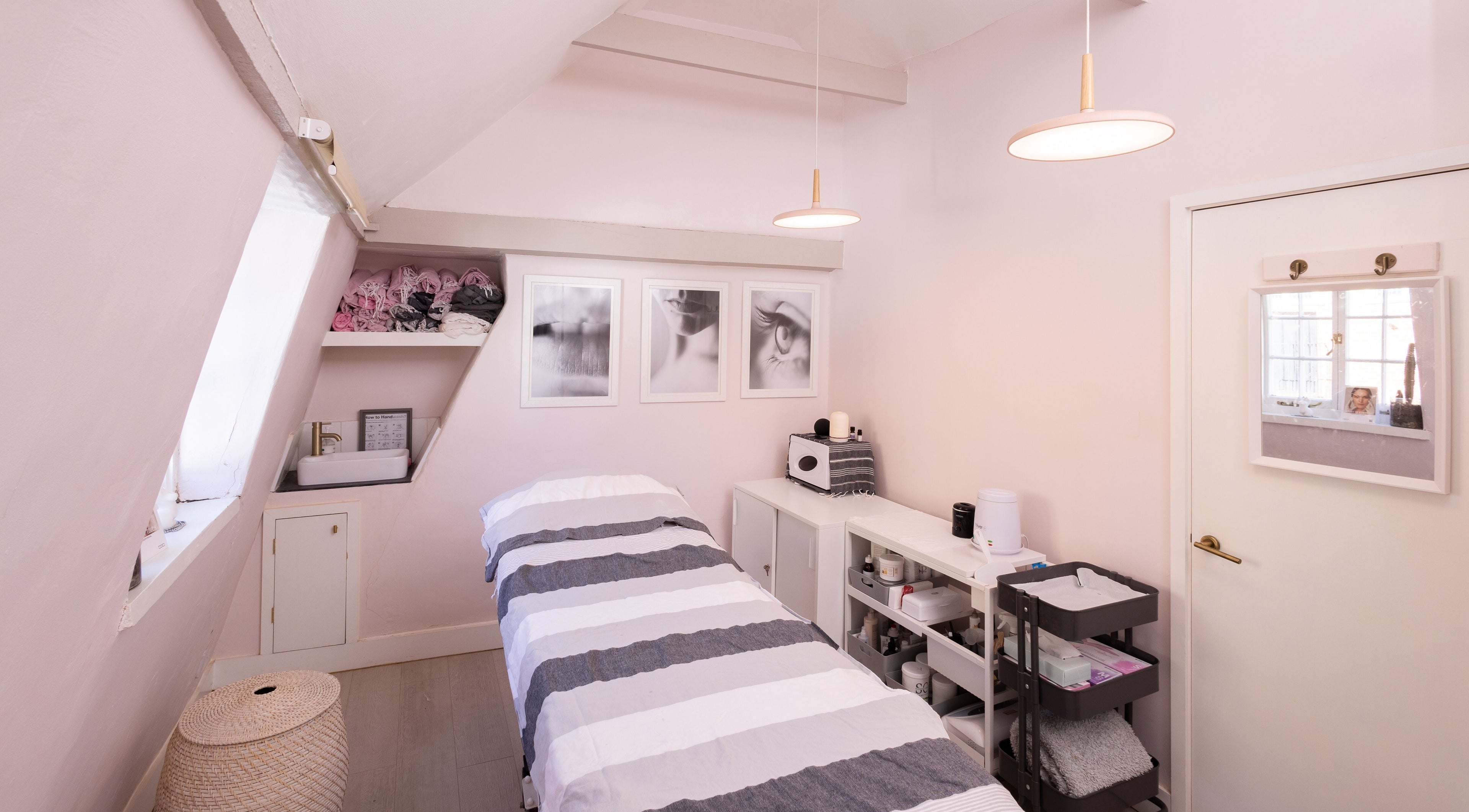 Calm treatment room at Bare Beauty Aesthetics for laser hair removal in Saffron Walden, England, GB.