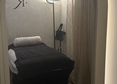Tranquil treatment room at Body Revolution Aesthetics, Leeds, England, GB. Soft lighting enhances relaxation.