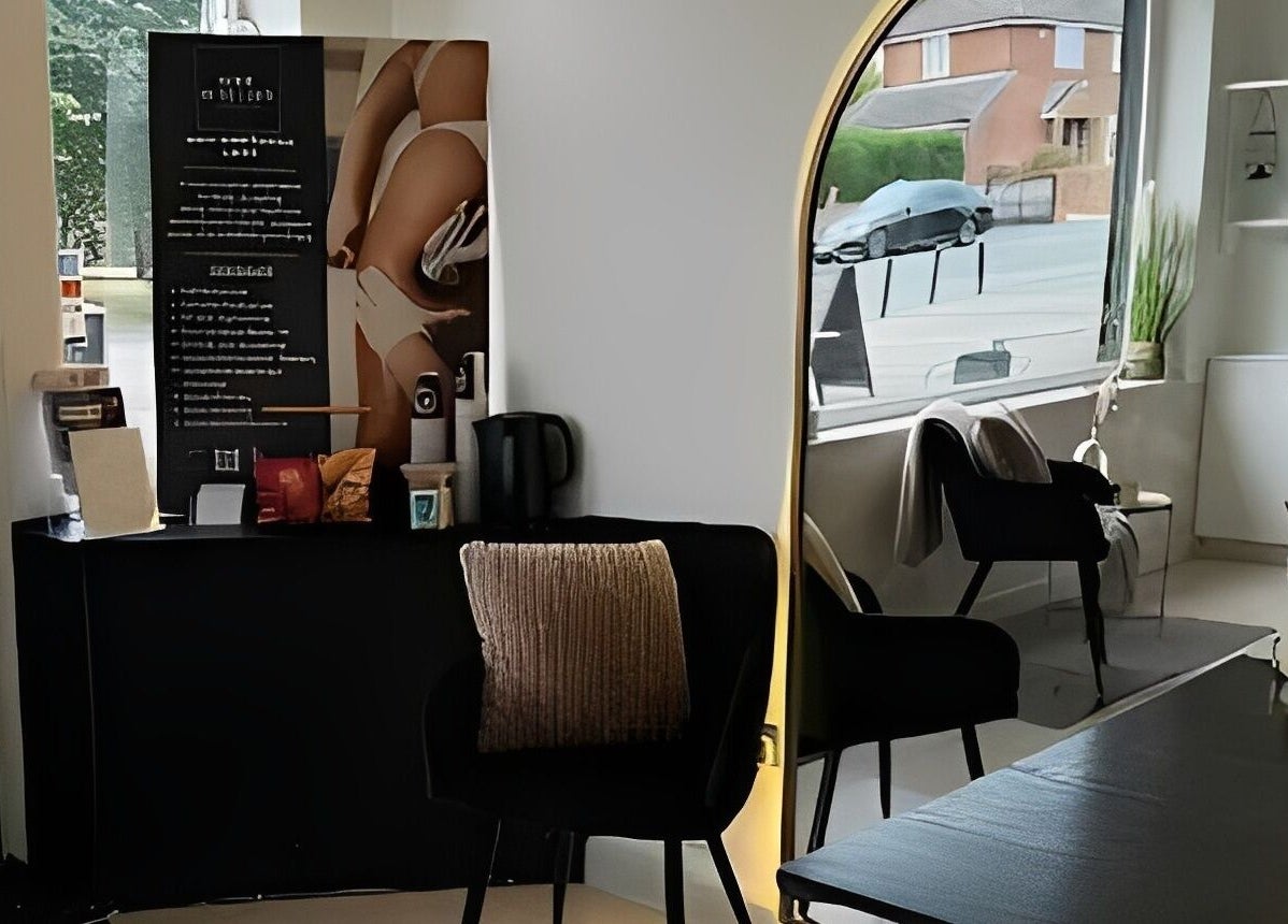 Welcoming interior of Body Revolution Aesthetics in Leeds, England, GB, featuring modern furniture and decor.
