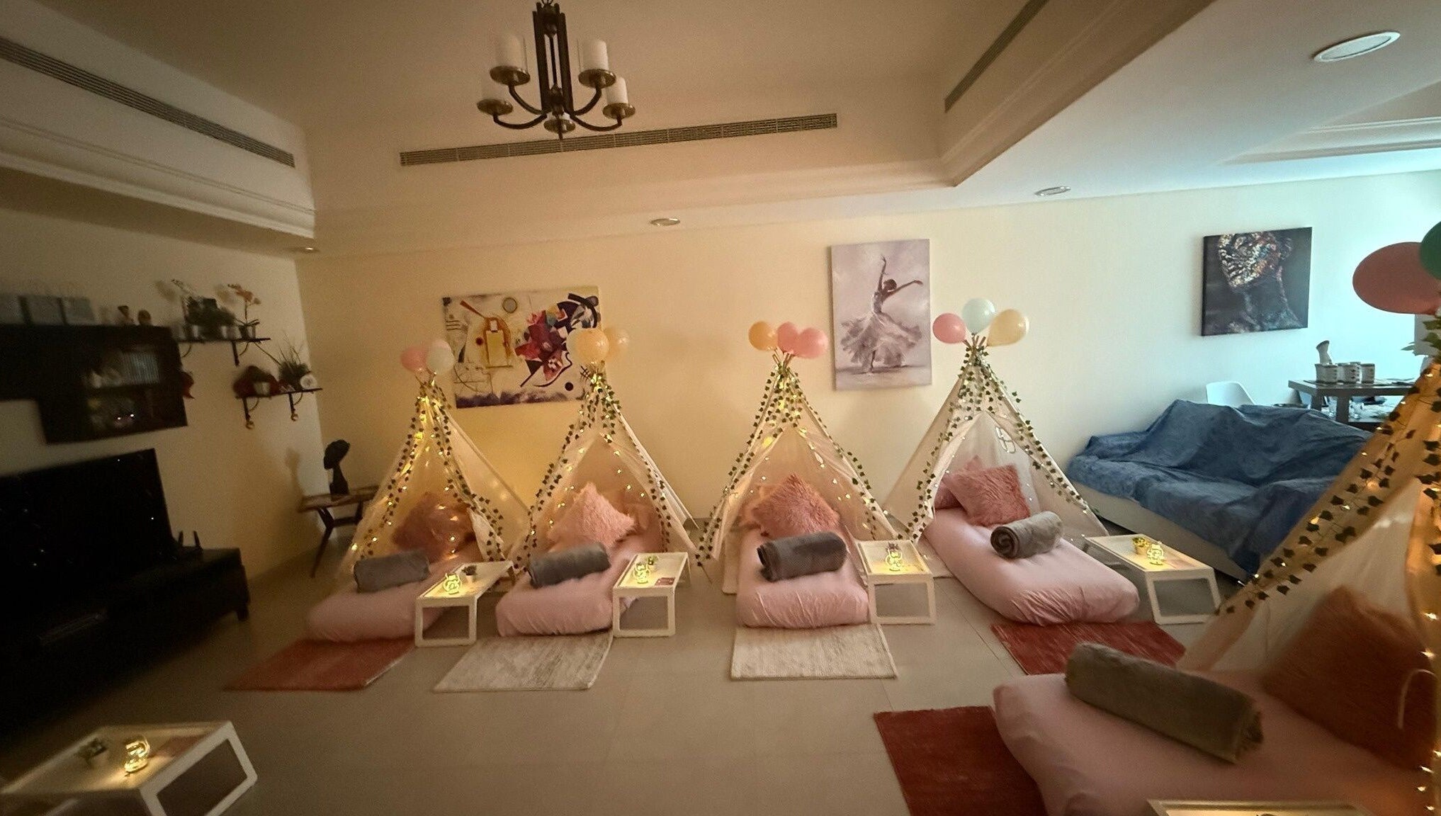 Relaxing setup at Hawaiian Hush Home Service - Dubai Only, featuring pink canopies and soft cushions in Dubai, Dubai, AE.
