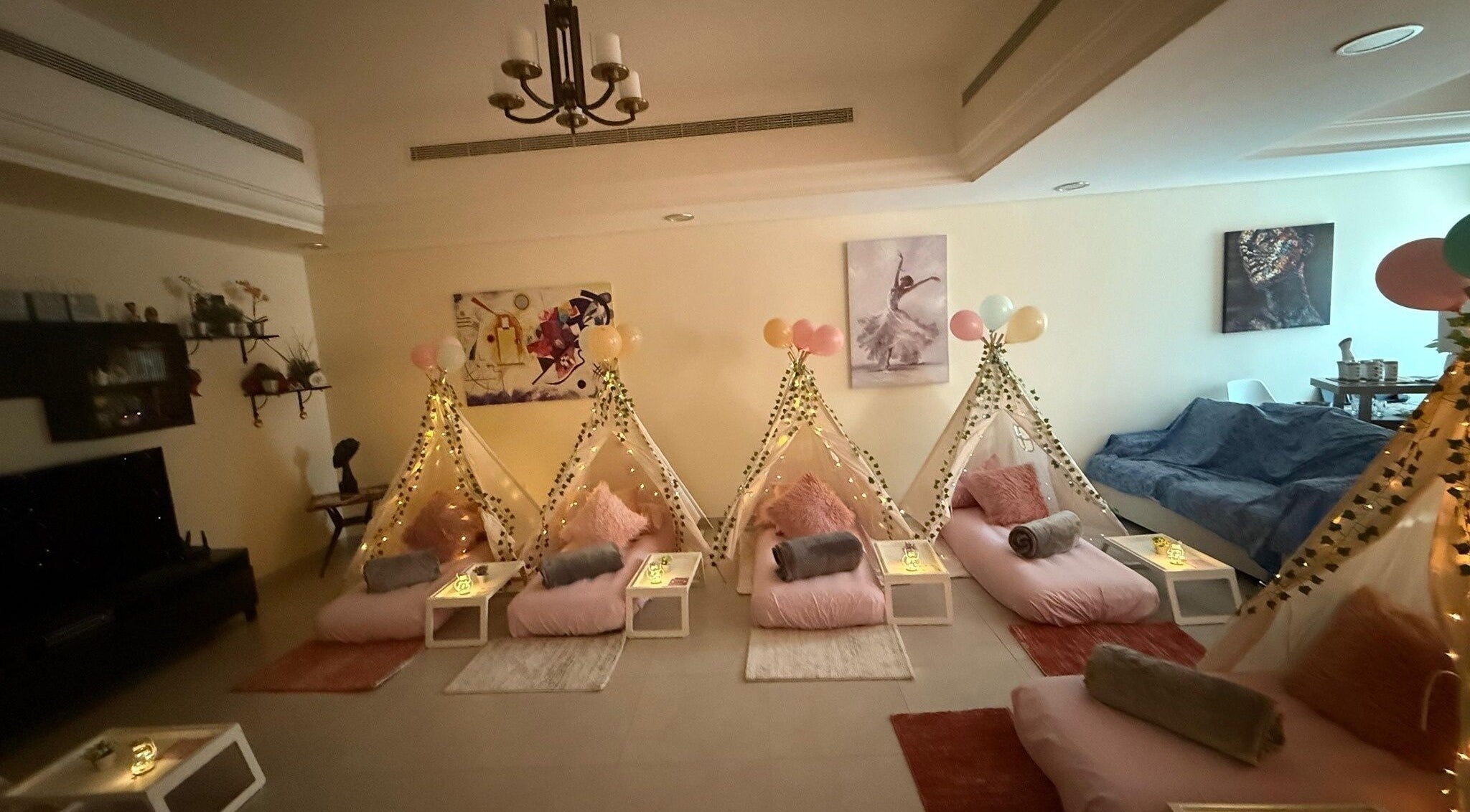 Relaxing setup at Hawaiian Hush Home Service - Dubai Only, featuring pink canopies and soft cushions in Dubai, Dubai, AE.