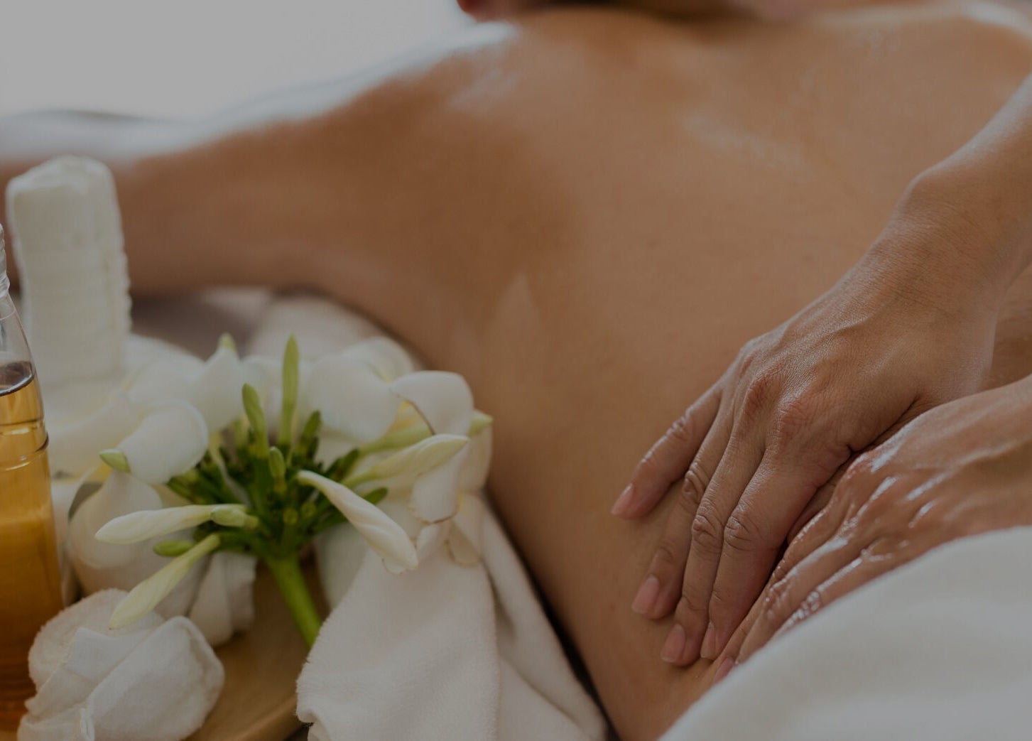 Client enjoying a massage with oils at Hawaiian Hush Home Service - Dubai Only, Dubai, Dubai, AE.