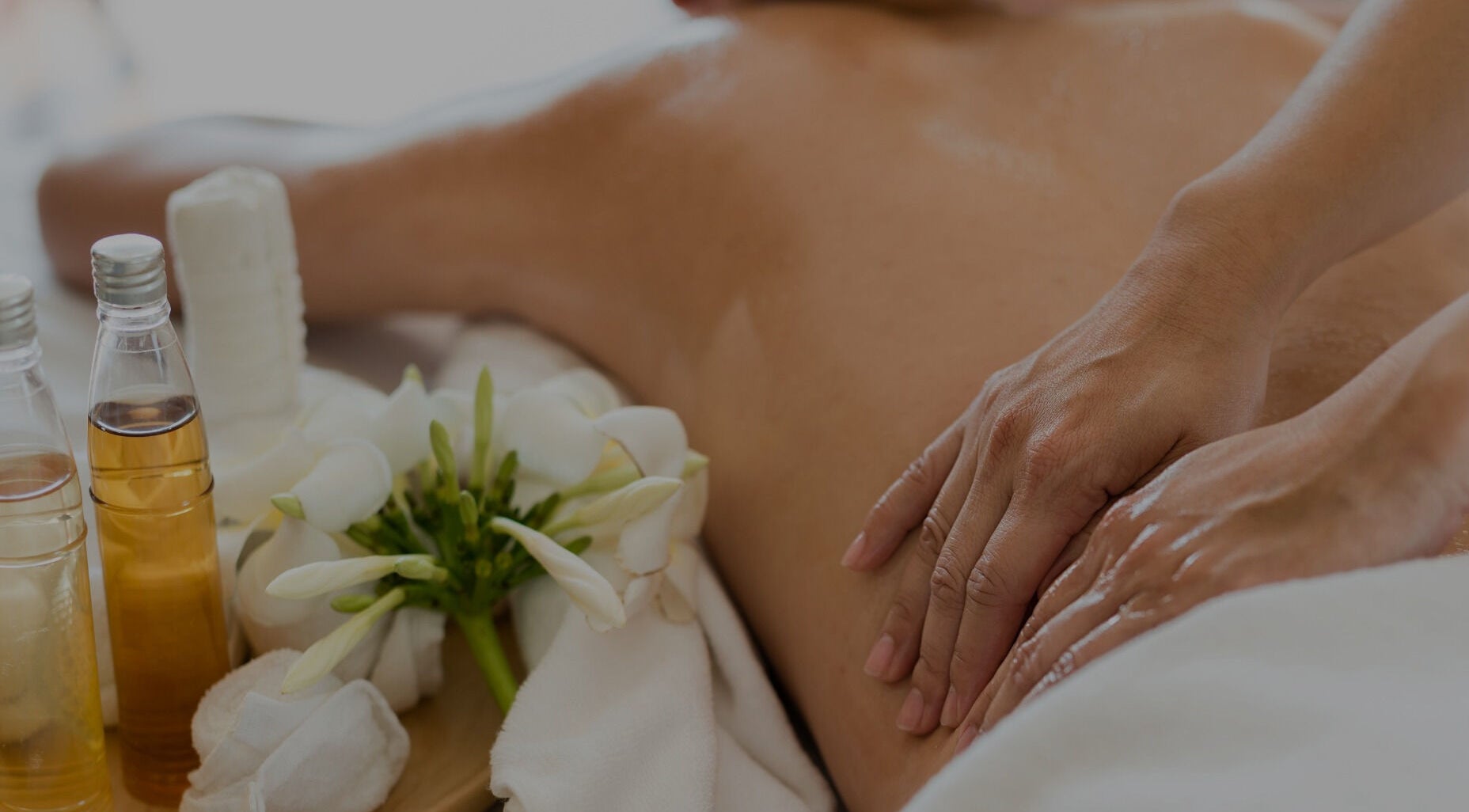 Client enjoying a massage with oils at Hawaiian Hush Home Service - Dubai Only, Dubai, Dubai, AE.