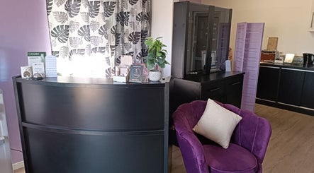 Chic reception area at Skin and Bling Brackenfell, Cape Town, Western Cape, ZA with stylish decor and seating.