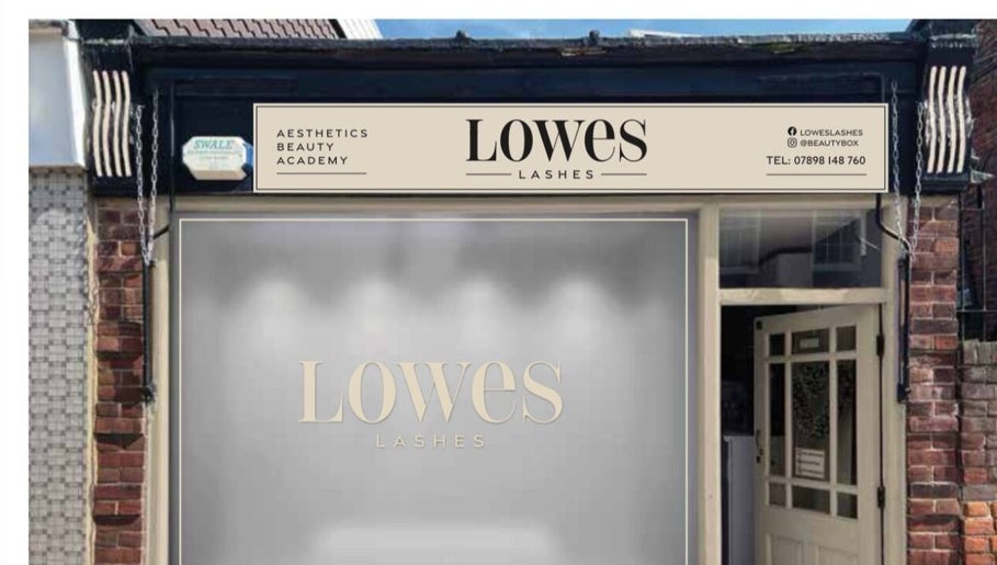 Front view of Lowes Lashes Aesthetics Sunbed in Faversham, England, GB featuring elegant signage.