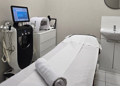 Treatment room at Orchid Beauty & Massage - Kensington, London, England, GB, featuring modern spa equipment.