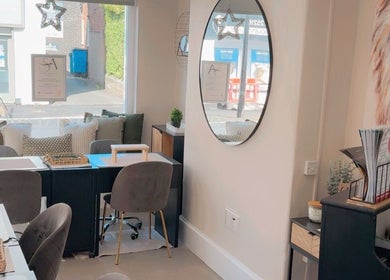 Chic interior of Tantalize in Telford, England, GB, featuring modern decor and inviting seating.