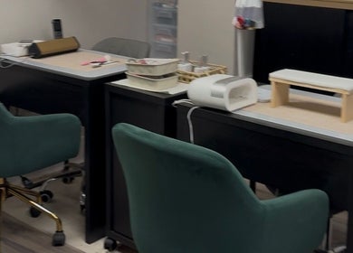 Tantalize nail care station with plush chairs in Telford, England, GB offering relaxing wellness experience.