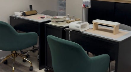 Tantalize nail care station with plush chairs in Telford, England, GB offering relaxing wellness experience.