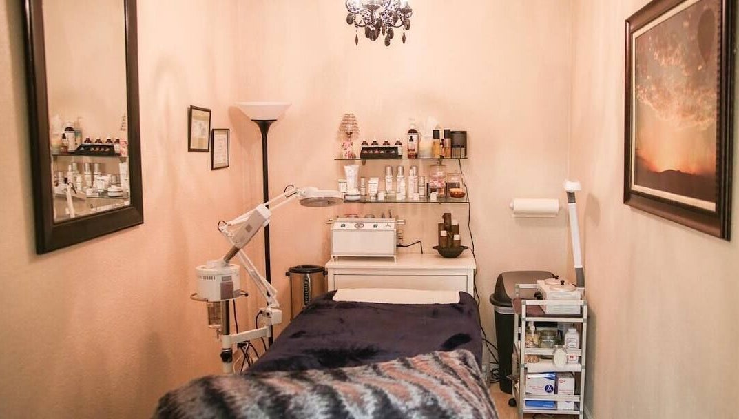 Cozy treatment room at Amore Lash Lounge in Auburn, California, US, featuring elegant decor and beauty equipment.